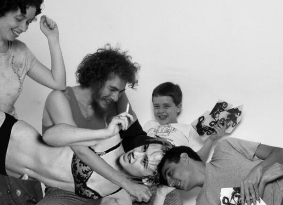 black-and-white photo of Edie Sedgwick, Michel Groisman, and other participants in "Polvo" (Octopus) a twister-like game